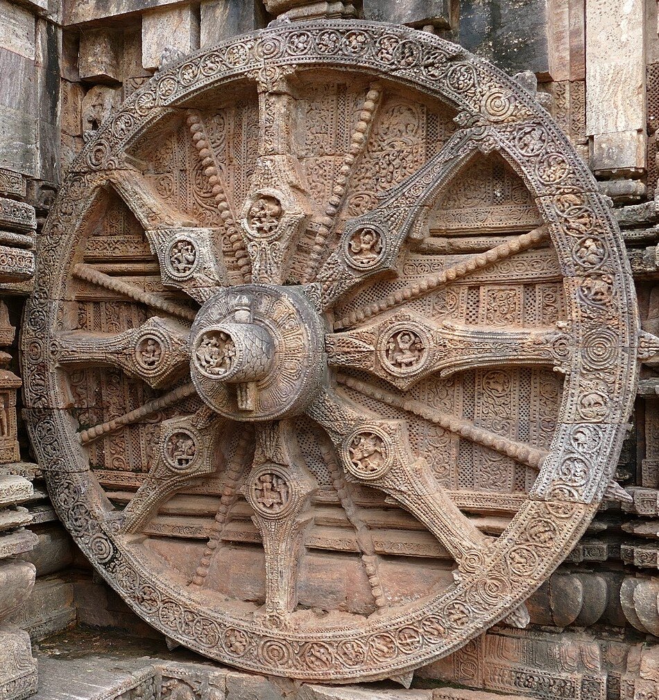 A carved stone chariot wheel on the Konark Sun Temple